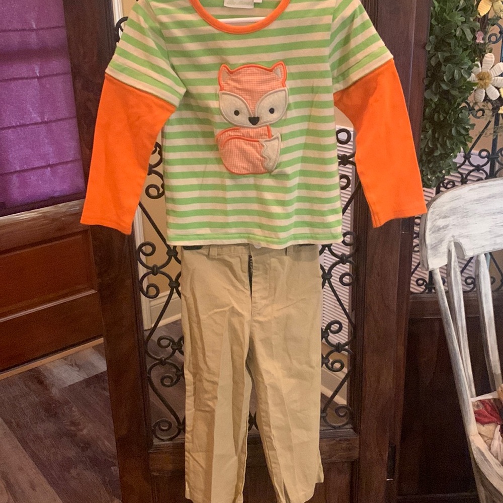 Cute outfit. Khaki pants and long sleeve shirt. Worn once. No stains.